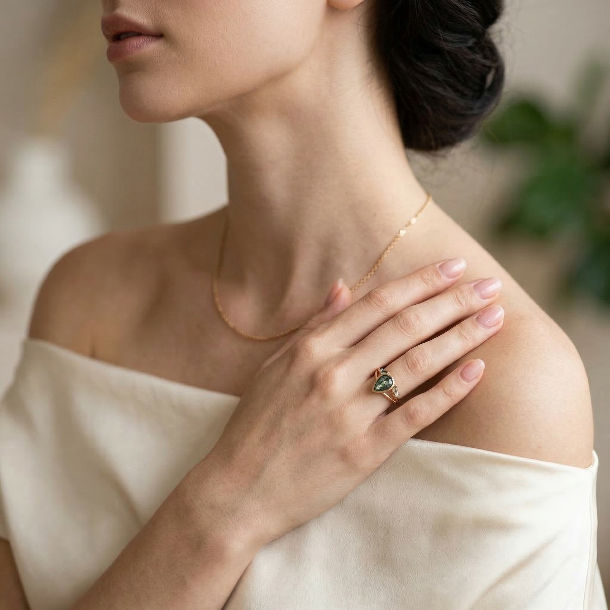 Angled view of Pear Moss Agate Ring in Gold