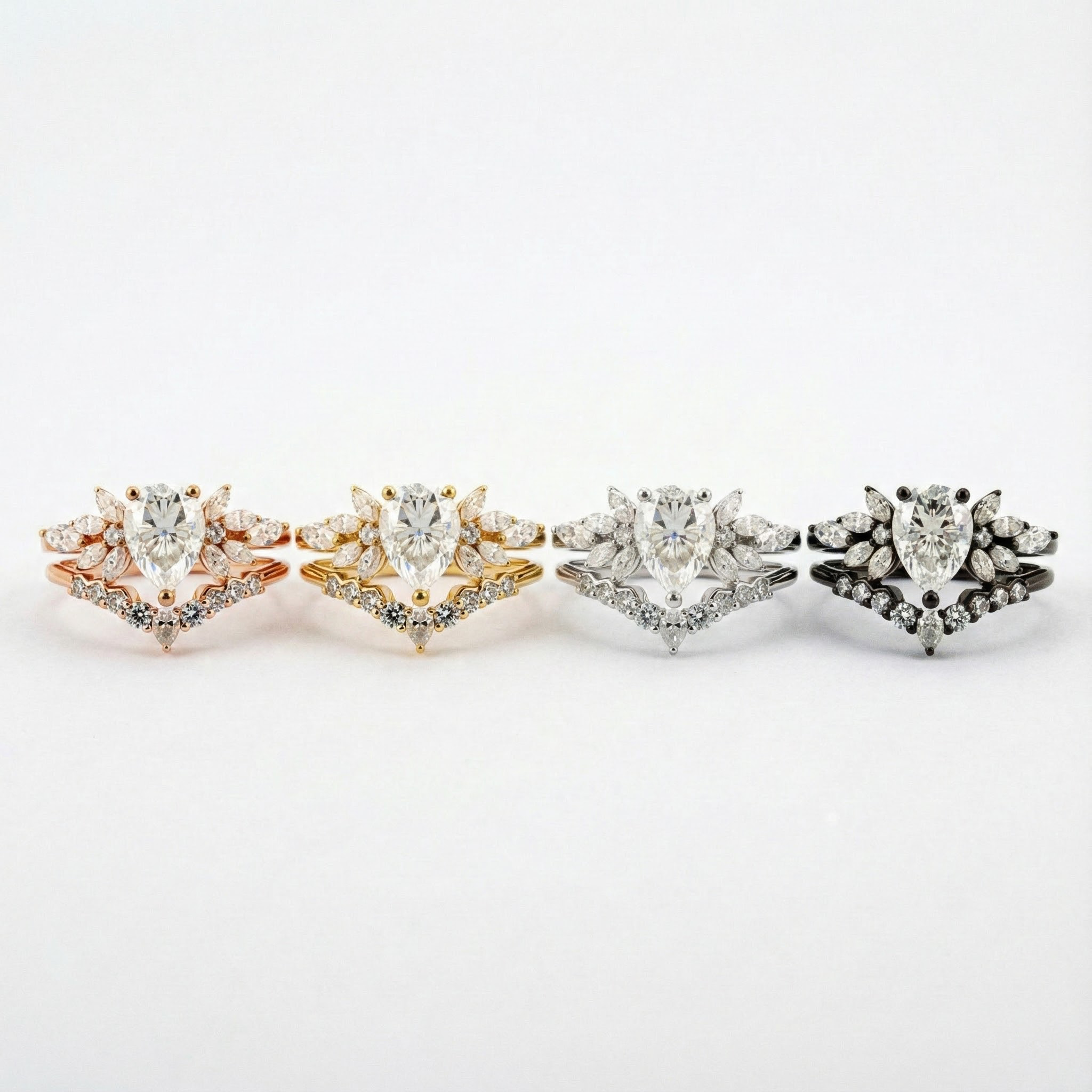 Exquisite pear moissanite ring set adorned with luxurious butterfly detail